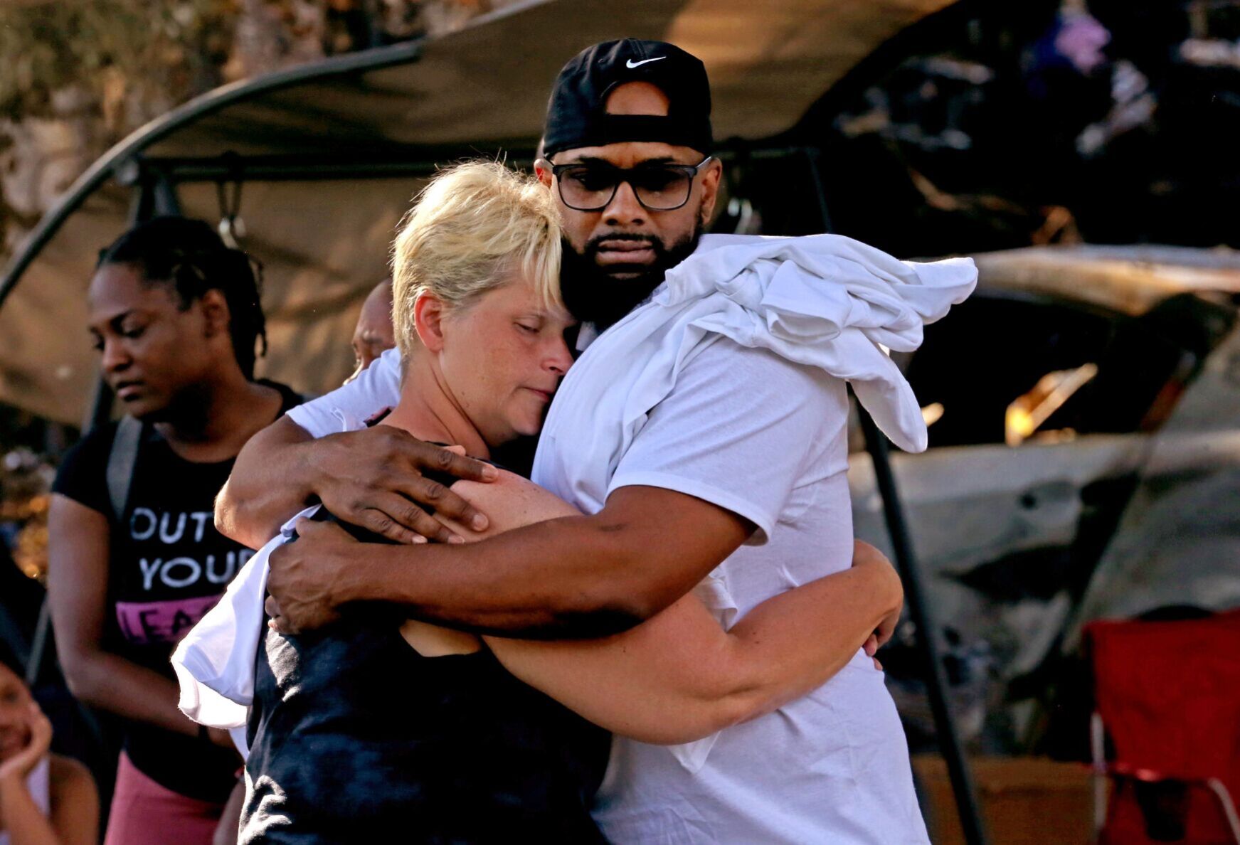 Family and friends honor the victims of house explosion near Black Jack